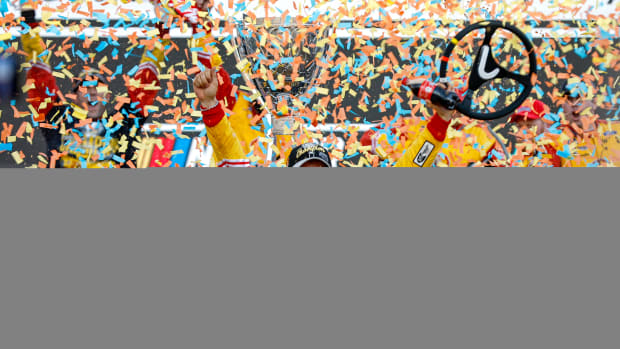 Joey Logano celebrates in victory lane after winning the 2022 NASCAR Cup Series Championship at Phoenix Raceway on Sunday. (Photo by Sean Gardner/Getty Images)